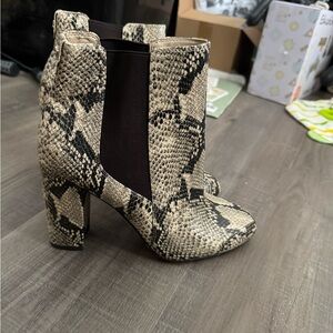 Snake skin heel boots
